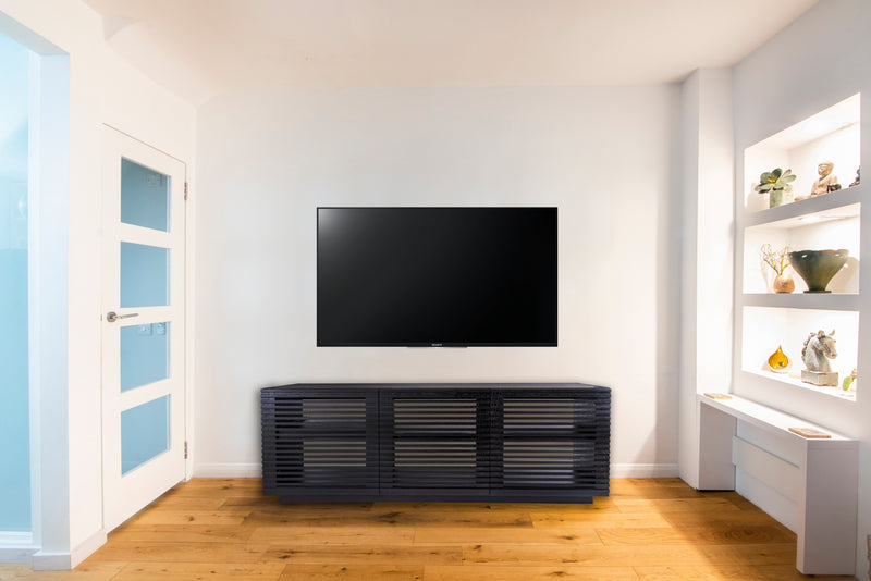 Audinni Linear Trio Large AV Cabinet handmade in the UKbelow TV in home with white walls