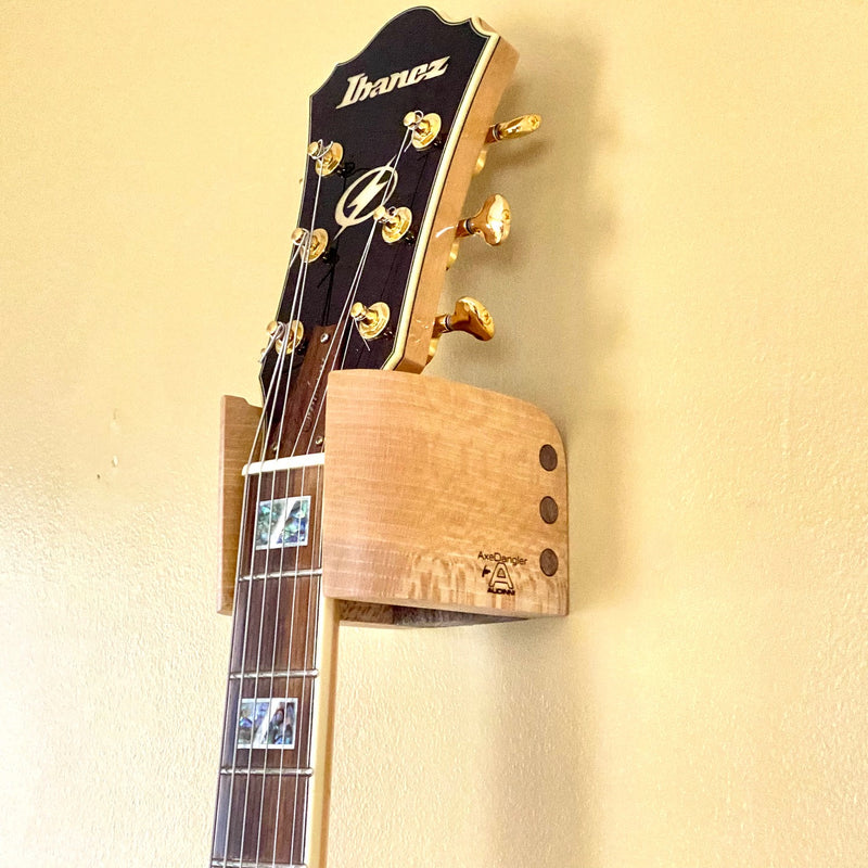 Audinni and Axe Dangler Guitar Wall Mount Cuff holding guitar