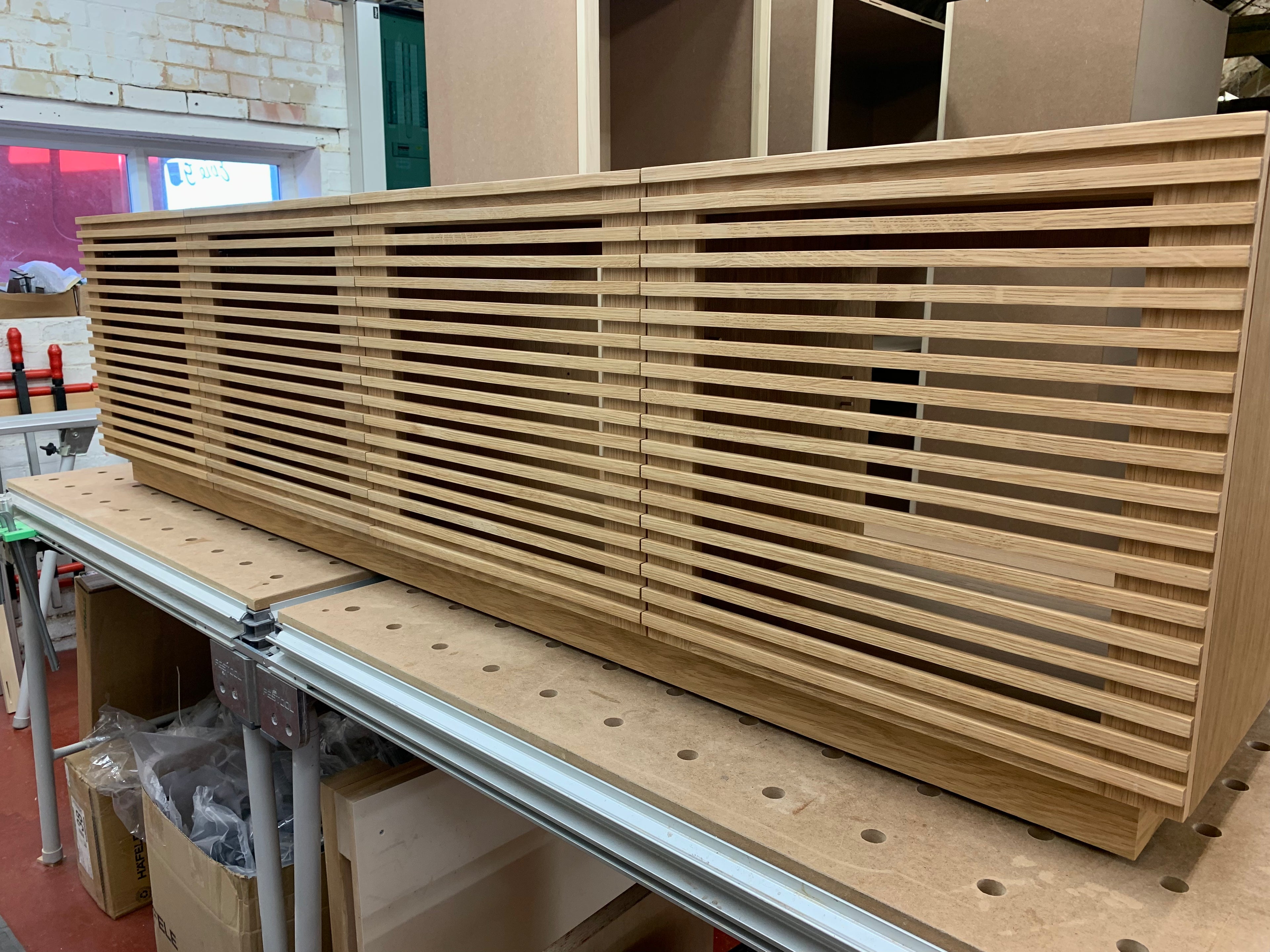 audio visual cabinets, bespoke media units with pull-out drawers, custom TV furniture for large screens, luxury wooden AV furniture, bespoke AV furniture UK, bespoke TV stands UK, custom-made TV cabinets UK, bespoke media units UK, made-to-measure TV furniture, bespoke audio visual cabinetry UK, custom hi-fi cabinets UK, handmade wooden TV units, bespoke fitted media cabinets, luxury TV furniture UK, bespoke furniture manufacturers UK, custom AV cabinetry UK.